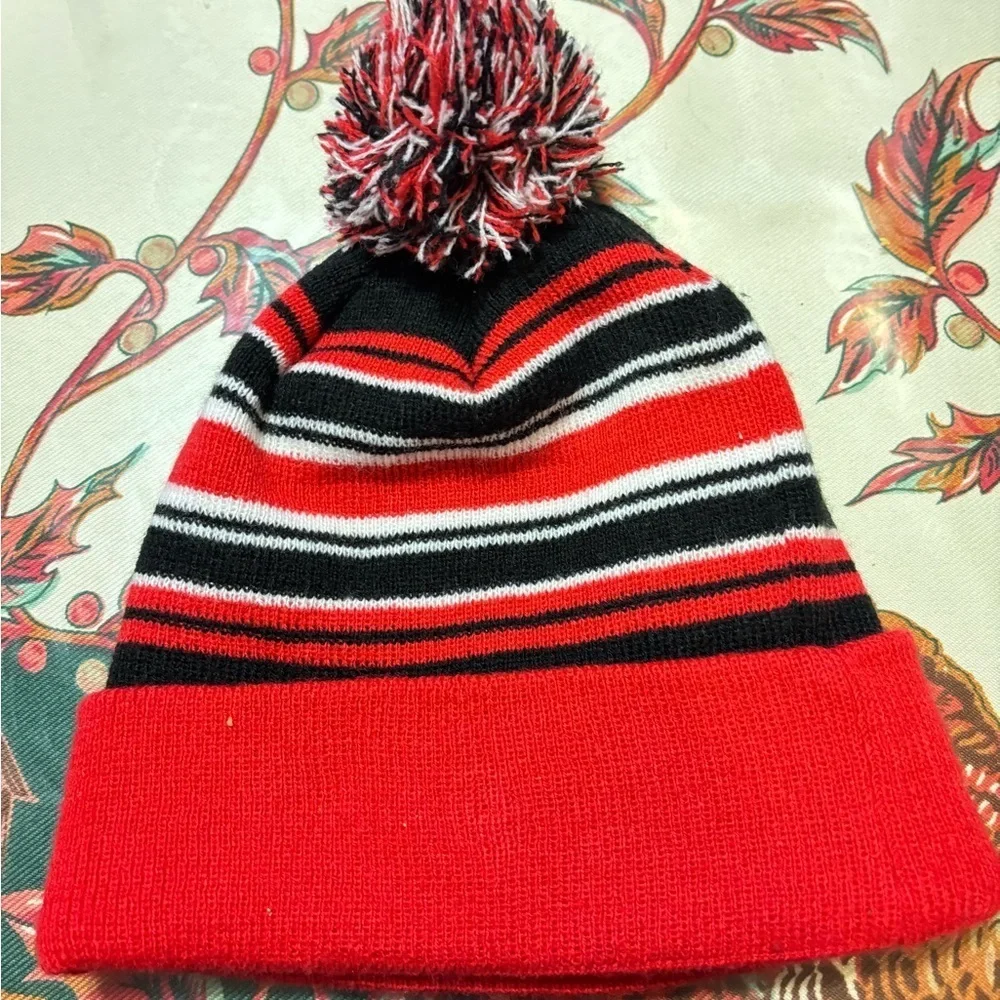 NEW ERA NBA TORONTO RAPTORS POM BEANIE STRIPED ADULT HAT RED BLACK MENS